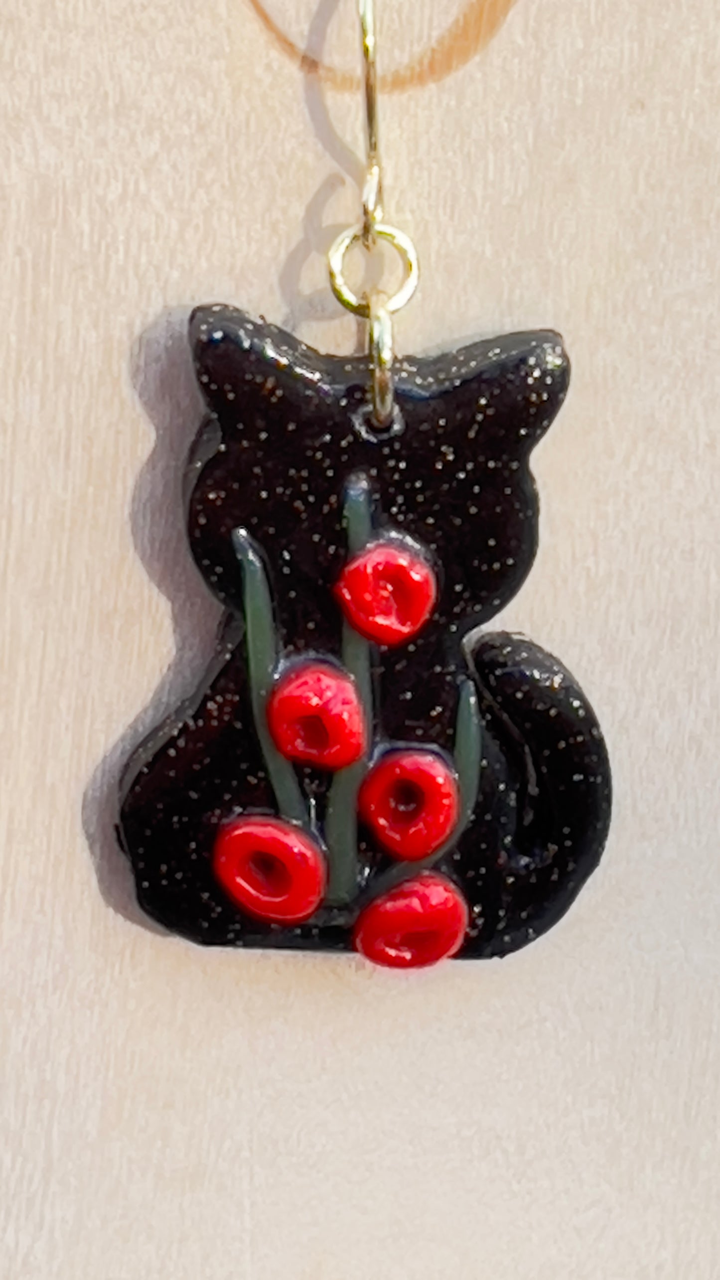 Black cats, red flowers dangling earrings