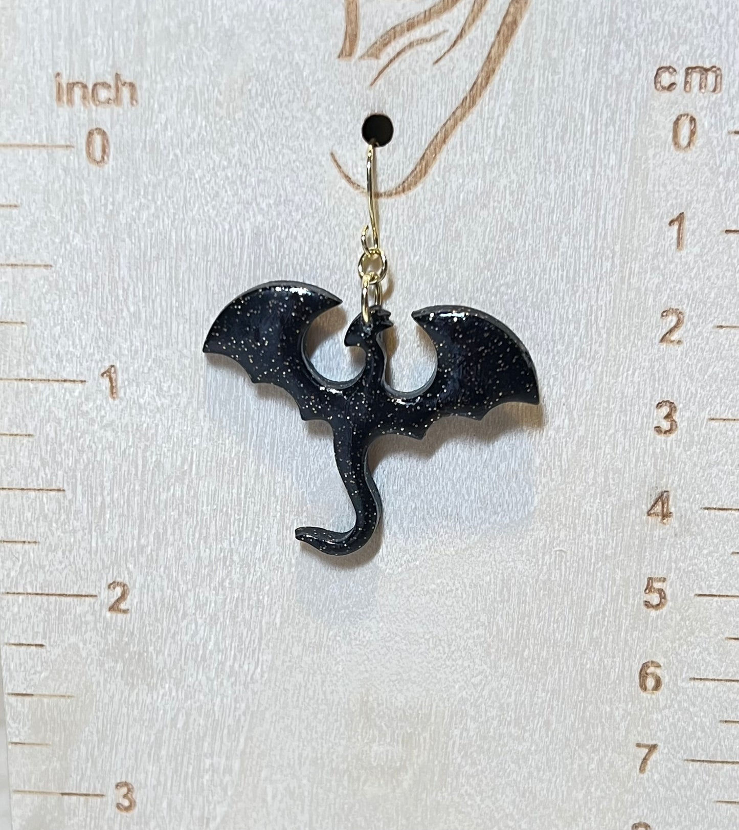 Black and gold dragon dangling earrings. 14k gold plated earrings