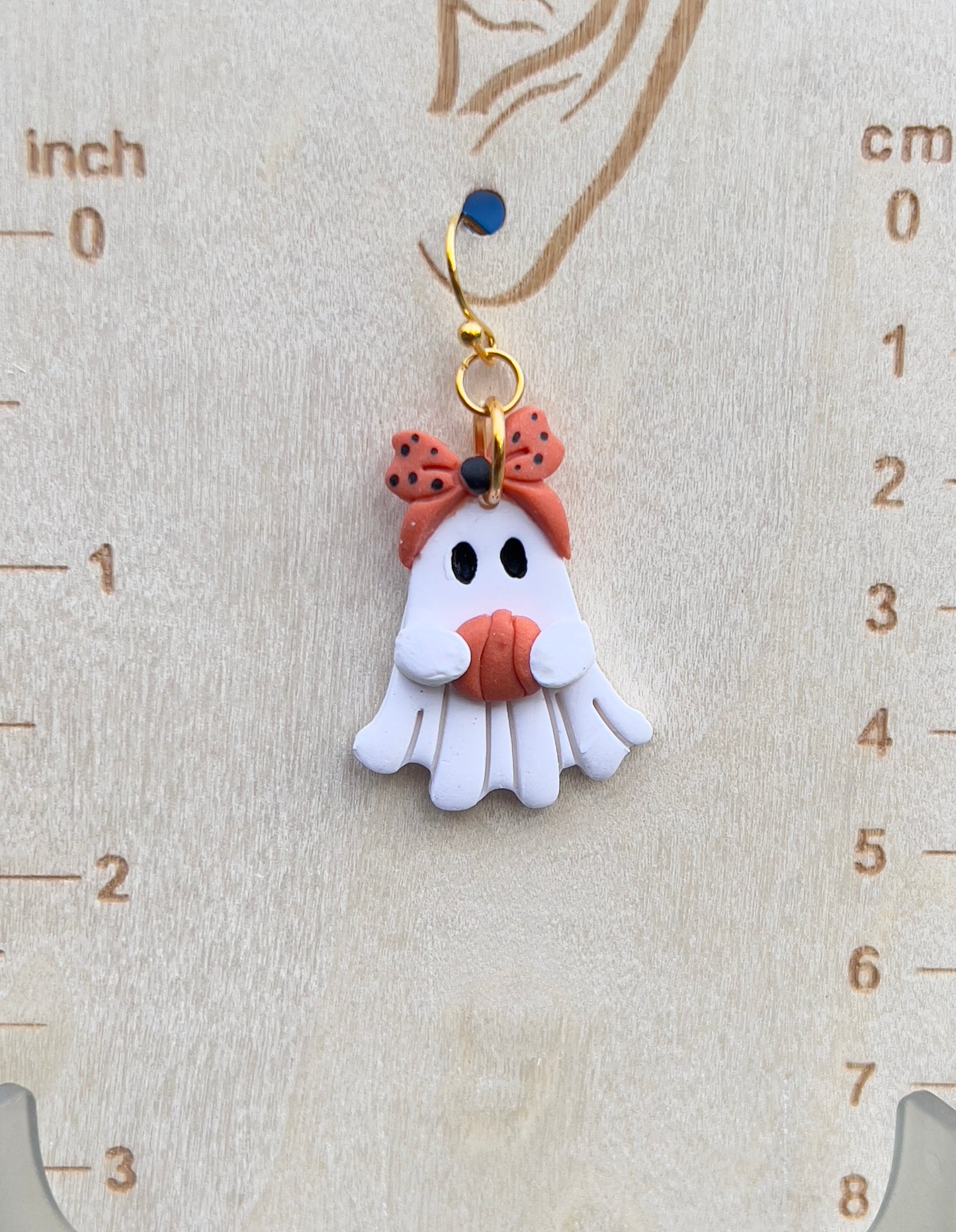 Ghost holding a pumpkin polymer clay light weight dangle earrings