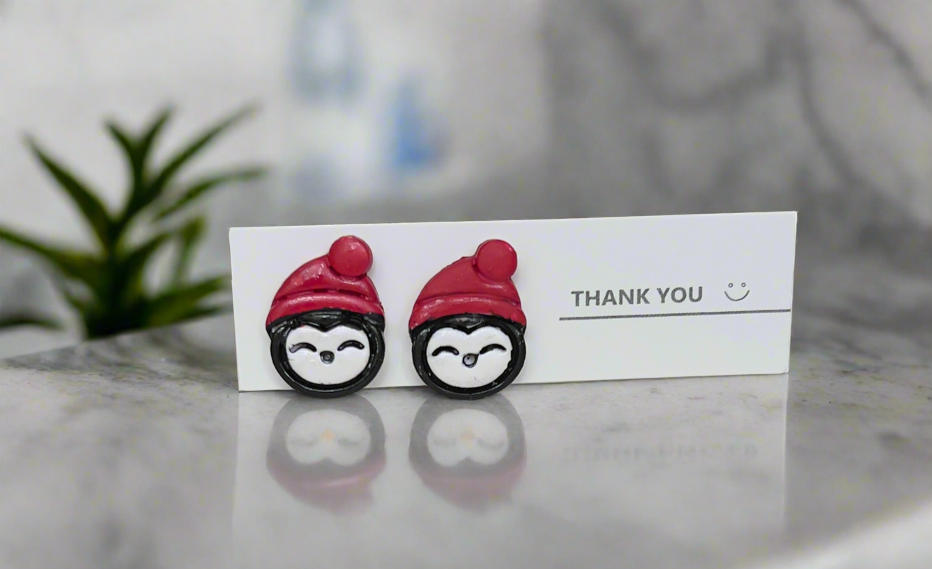 Penguin stud earrings