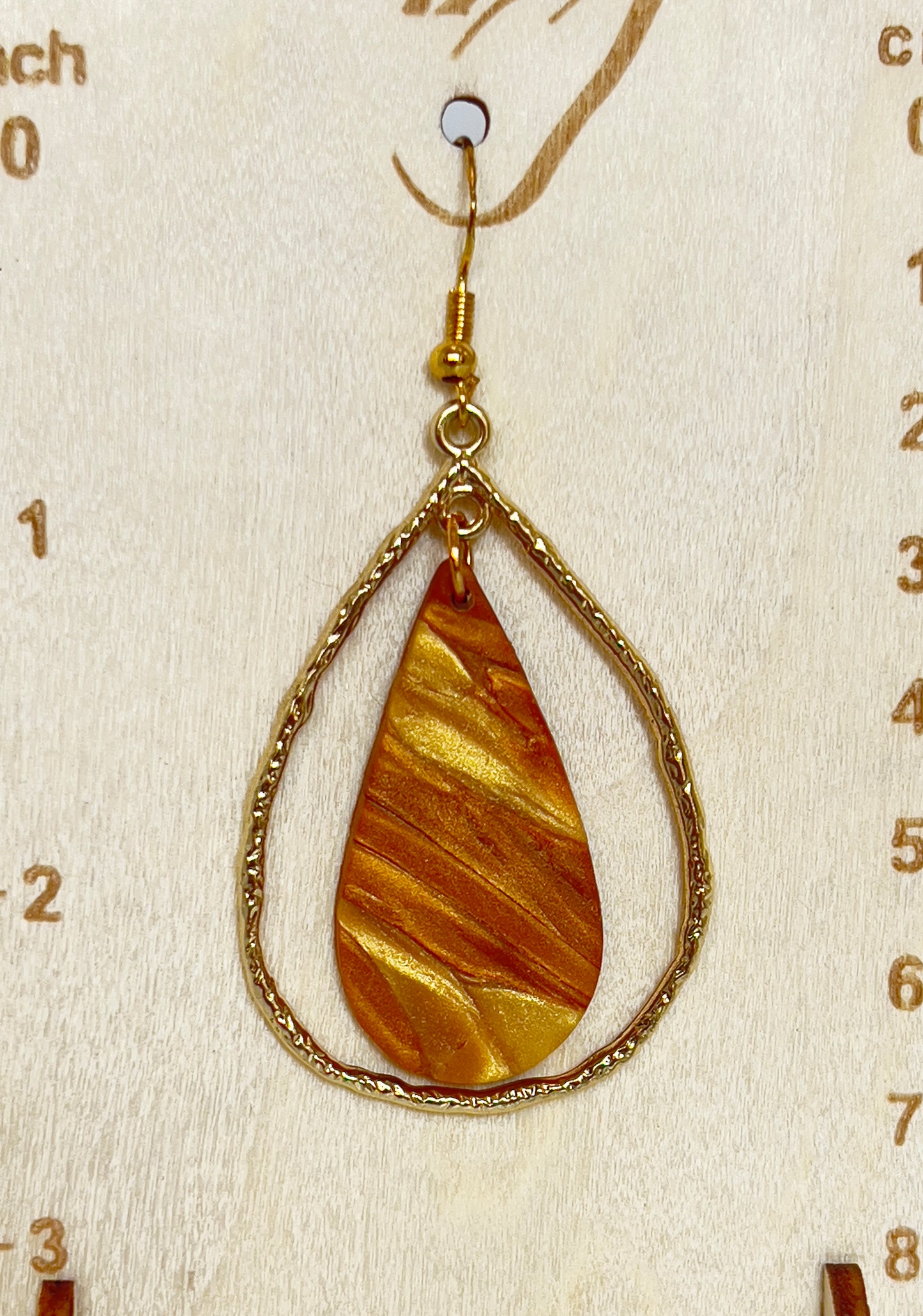 Gold Teardrop with varying copper and gold teardrop polymer clay earrings. Each earring is handmade. hypoallergenic hooks