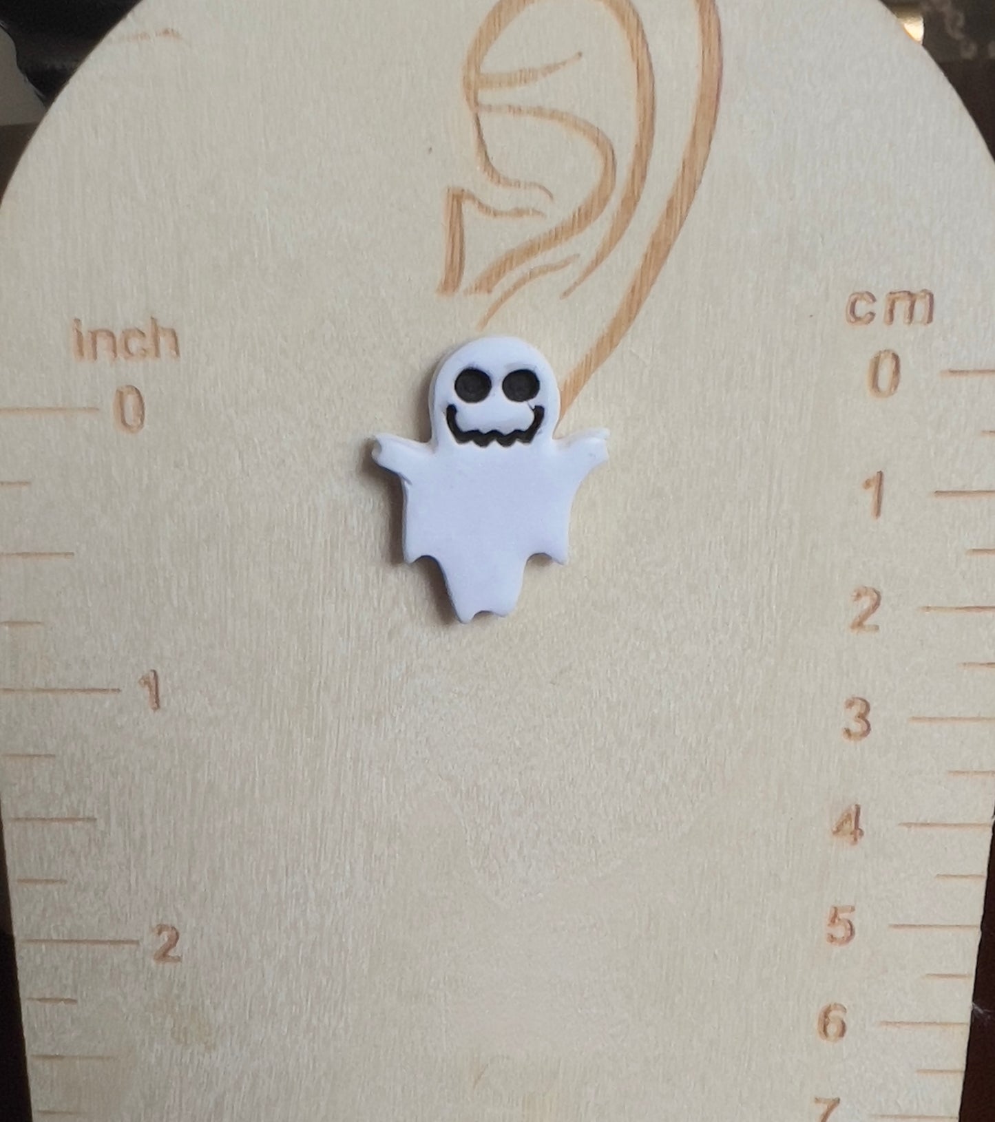 white ghost stud earrings