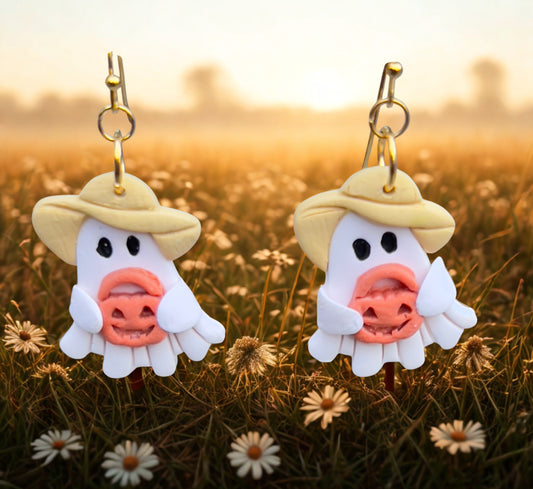 Ghost wearing a sun hat holding jack-o’-lantern lightweight clay earrings