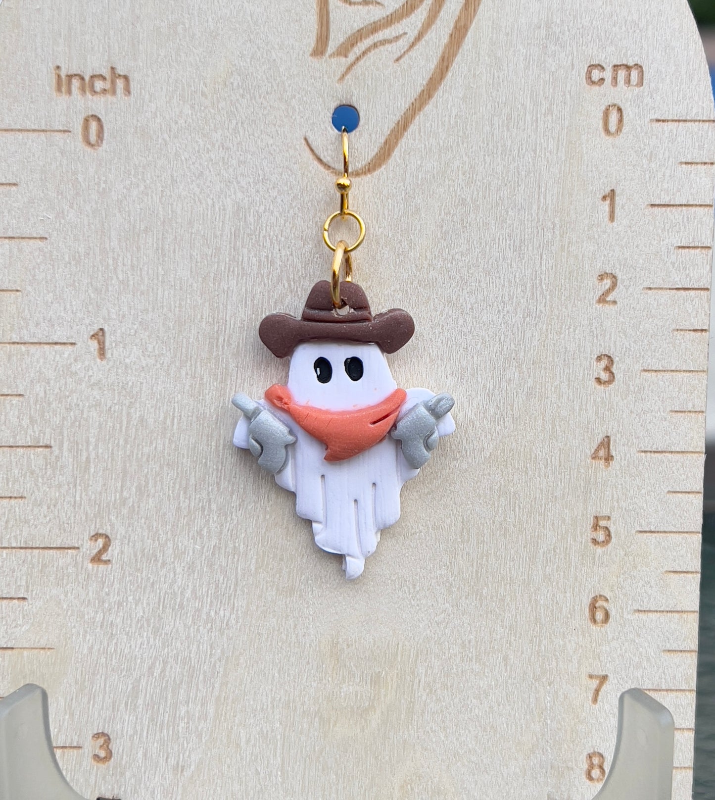 Cowboy ghost lightweight clay earrings.