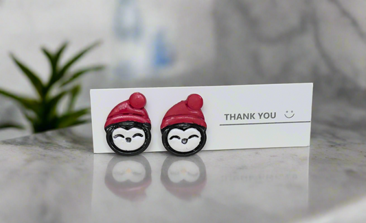 Penguin stud earrings